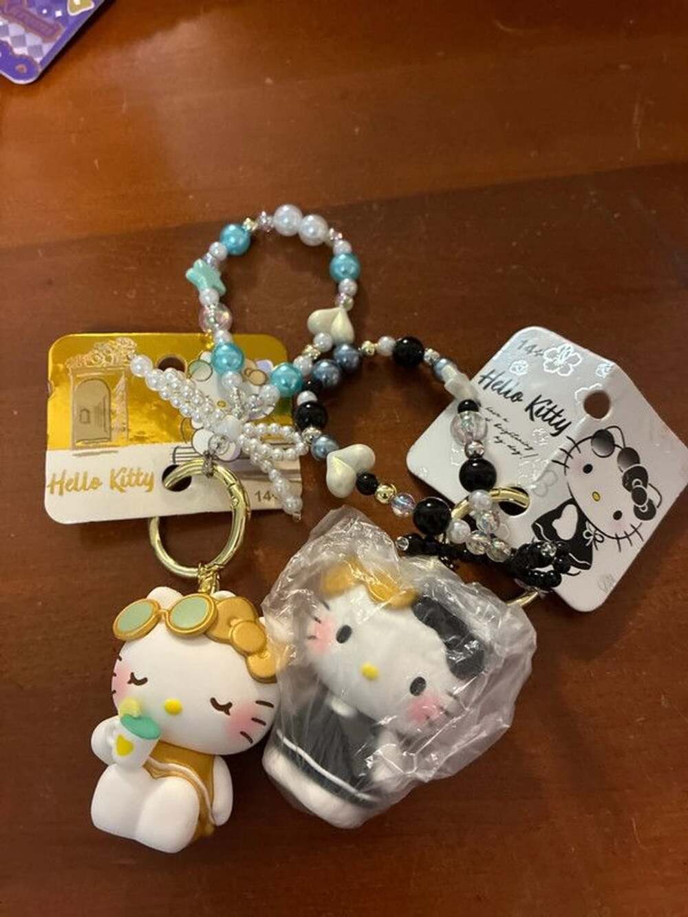 Set of 2 Sanrio Hello Kitty figures keychains with bracelets nwt